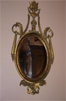 Pr of french form wood guilded mirror with