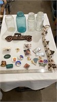 Assorted magnets, vintage mason jar, decorative