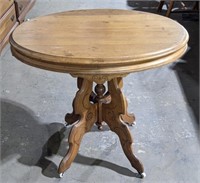 (L) Antique Oval Carved Wood Rolling Side Table.