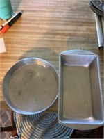 Two round cake pans, two loaf pans