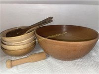Wooden bowls, spoons, masher