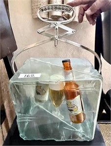 Falstaff ice block and tongs bar decor