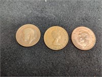 Three (3) large pennies