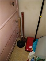 lot of cleaning supplies, plungers, etc.