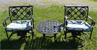 Three piece cast metal patio set: two swivel chair