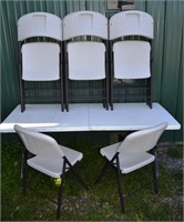 11 Lifetime folding chairs and folding 6' table