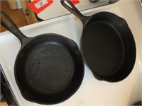 (2) CAST IRON PANS