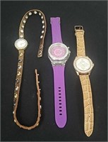 Two bling watches and one unique watch