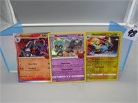 Three Pokemon Cards