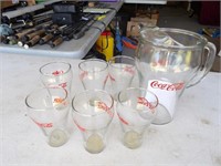 Coca Cola pitcher and 6 glasses