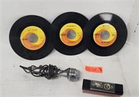 The Beatles 45 records. Microphone and vinyl