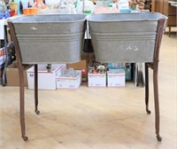 Vintage pair of wash tubs on metal stand