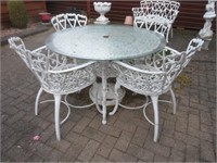 cast aluminum table and chairs .