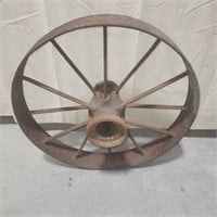 Antique farm implement wheel