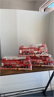 3 new toy fire trucks