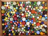 Flat of glass marbles including 24 shooters