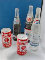 Collectible soft drink botles and cans.