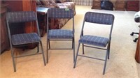 3 Blue folding chairs