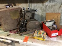Vintage Ampro reel projector and reel films