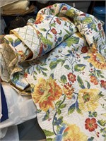 Reversible comforter with one pillow sham and bed