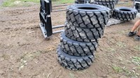 (4) New 10x16.5 Skidsteer Tires