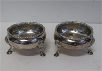 Two antique English round sterling silver salts