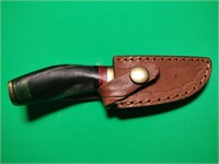 Damascus With Ram Horn Handle