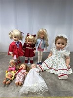 Assortment of plastic and rubber dolls and baby