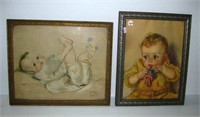 (2) Framed vintage baby prints. Largest measures