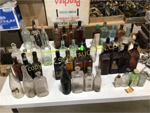 44 vintage glass bottles, Doyle’s and Dr. Soule