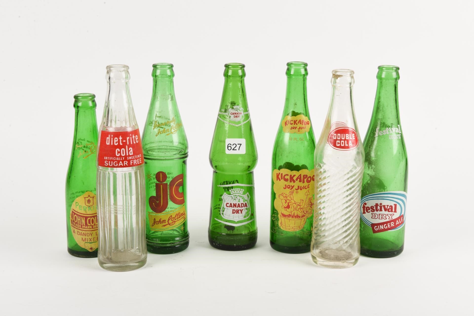 LOT OF 7 VINTAGE BEVERAGE BOTTLES/ NO CAPS