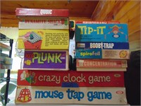 STACK OF OLD GAMES, TIP-IT, CRAZY CLOCK GAME,