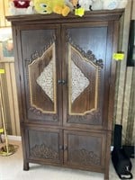 Four door , four drawer Armoire. 45 in wide 25 in