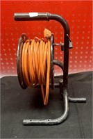 (1) EXTENSION CORD ON REEL