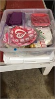 Tote of party plates and napkins