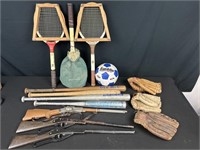 Tennis rackets, aluminum and wood baseball bats,