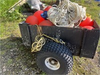 ATV trailer, full of buoys and rope