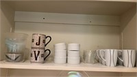 Shelf of miscellaneous lot of bowls , coffee cups