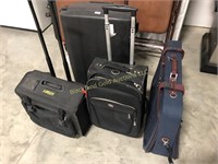 Lot of Four Suitcases