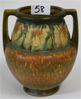 Roseville pottery double handle vase, daisies