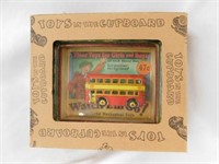 Toys in Cupboard double decker bus in shadow box,