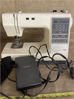Kenmore LE 100 stitch sewing machine w/ misc