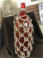Red bottle Wrapped in Rope