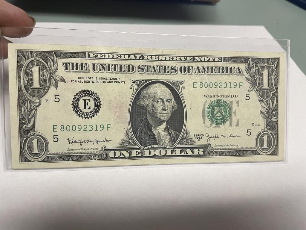 1963 B  one dollar bill in plastic holder