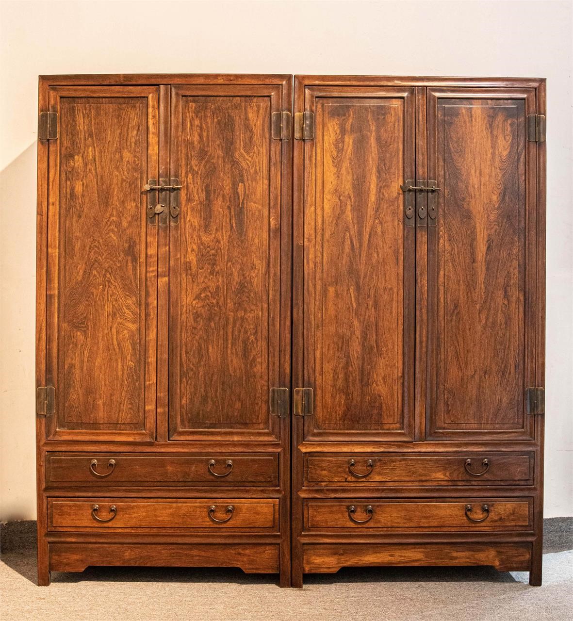 A pair of yellow pear wood cabinets