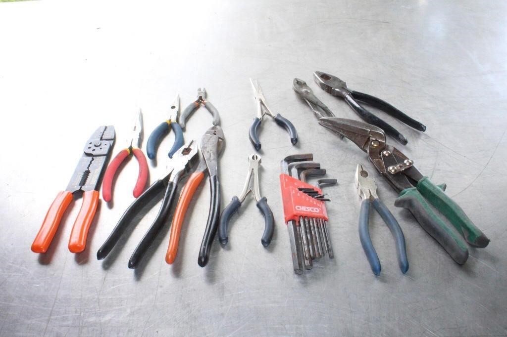 Assortment of pliers, wire cutters, tin snips, all