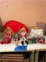 Dolls (3); bag of small cars (played with);+
