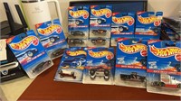 12 Hot wheels New on Card. This lot includes 1-4