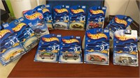 12 Hot wheels New in cars this lot includes