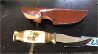 WHITE TAIL CARVED HANDLE KNIFE IN LEATHER SHEATH